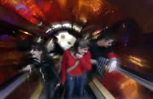 Kids entering Earth Galleries through the globe