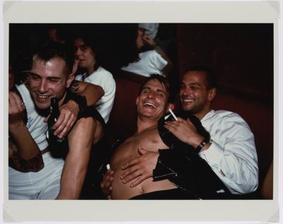 Nan Goldin, Clemens, Jens and Nicolas Laughing at
Le Pulp, Paris, 1999 © Nan Goldin. Courtesy of Nan
Goldin and Gagosian