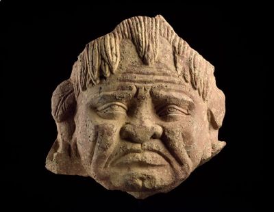 Head of a grimacing yaksha, about 2nd
or 3rd century